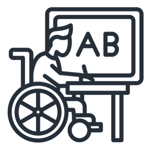 Person in wheelchair writing at desk.